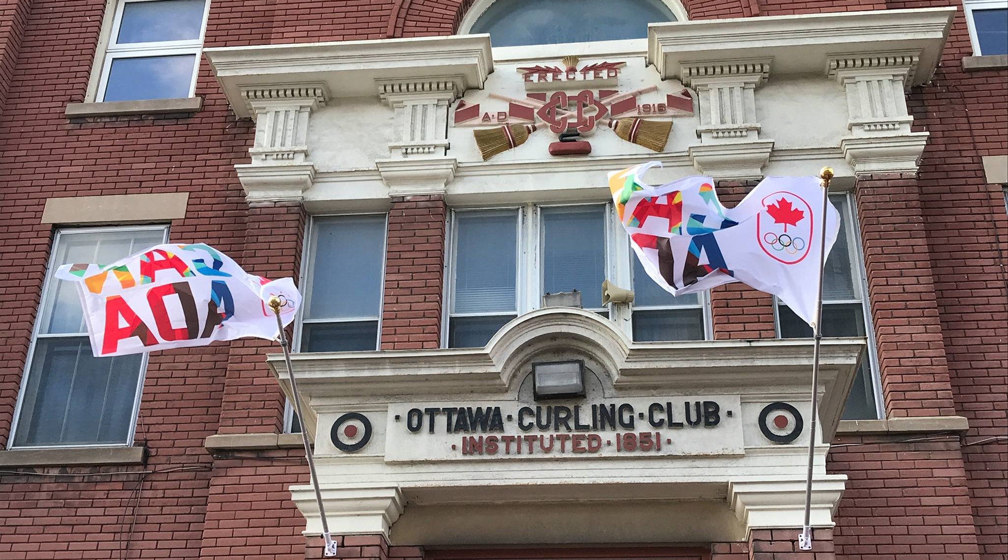 OCC Olympics Facade with Flags